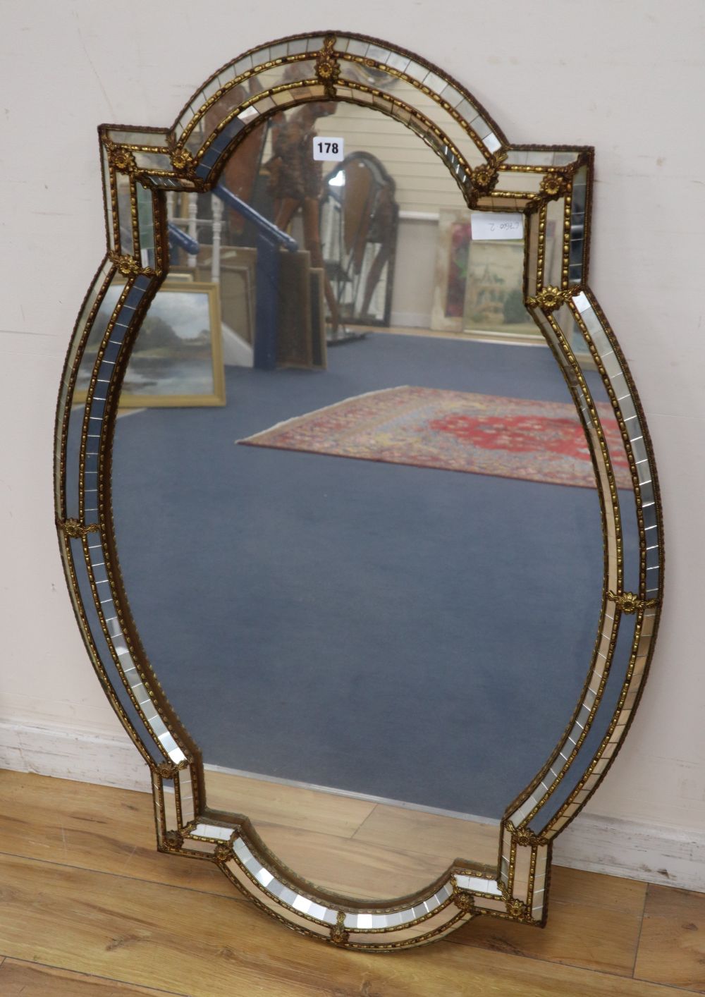 A Venetian style wall mirror, width 72cm height 110cm